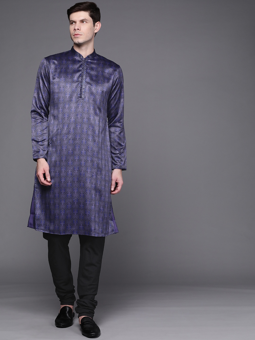 

Manu Men Blue & Black Ethnic Motifs Printed Regular Kurta with Churidar