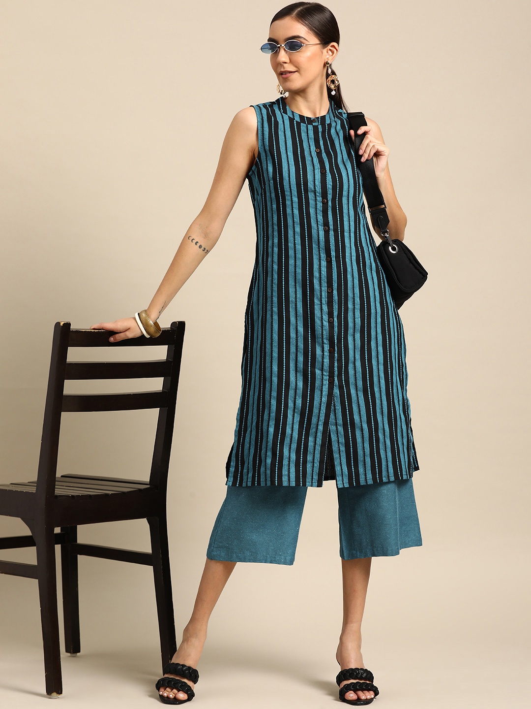 

Anouk Women Teal Green & Black Striped Yarn Dyed Kurta with Palazzos