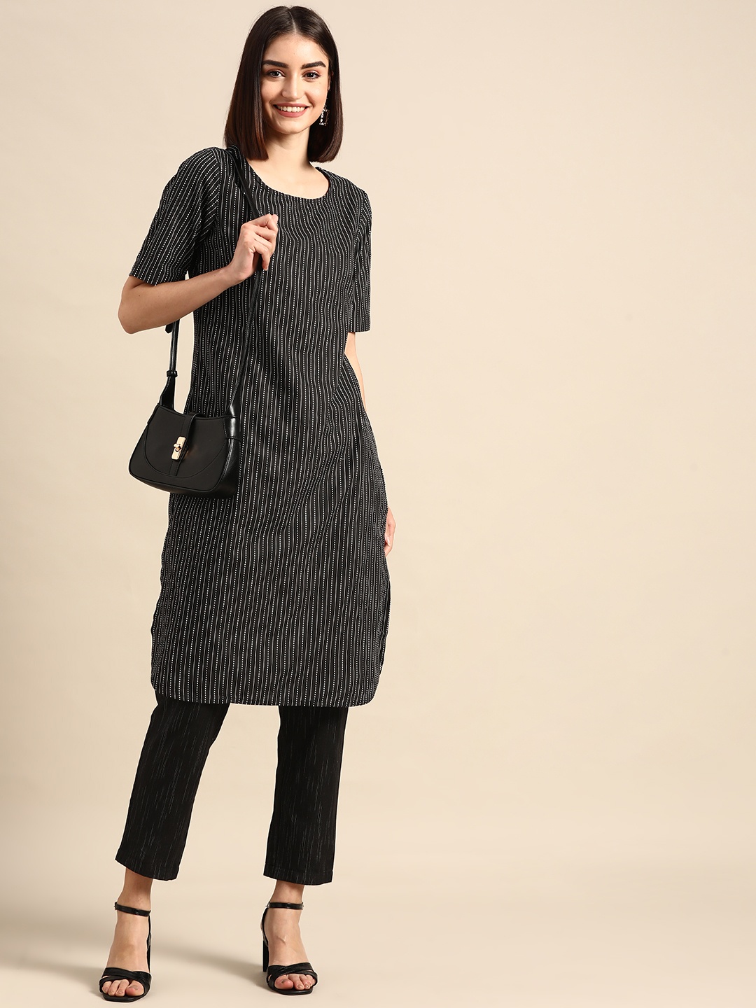 

Anouk Women Black Striped Yarn Dyed Kurta with Trousers