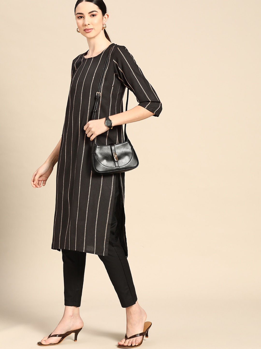 

Anouk Women Black & Beige Embroidered Yarn Dyed Kurta