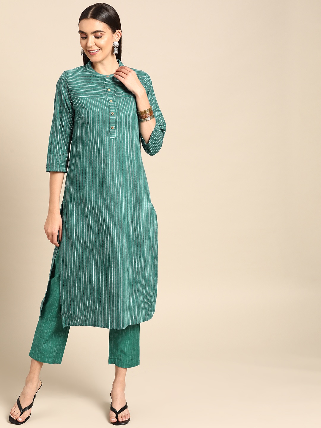 

Anouk Women Green Striped Kurta with Yarn Dyed Trousers