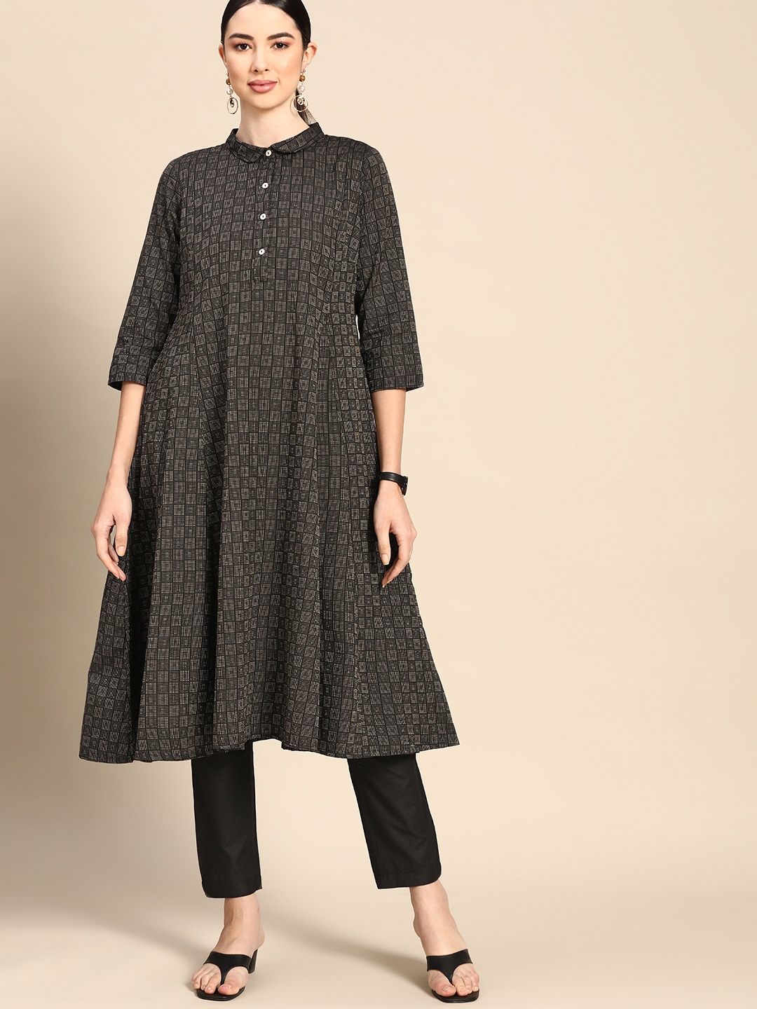 

Anouk Women Black Embroidered Yarn Dyed Kurta with Trousers
