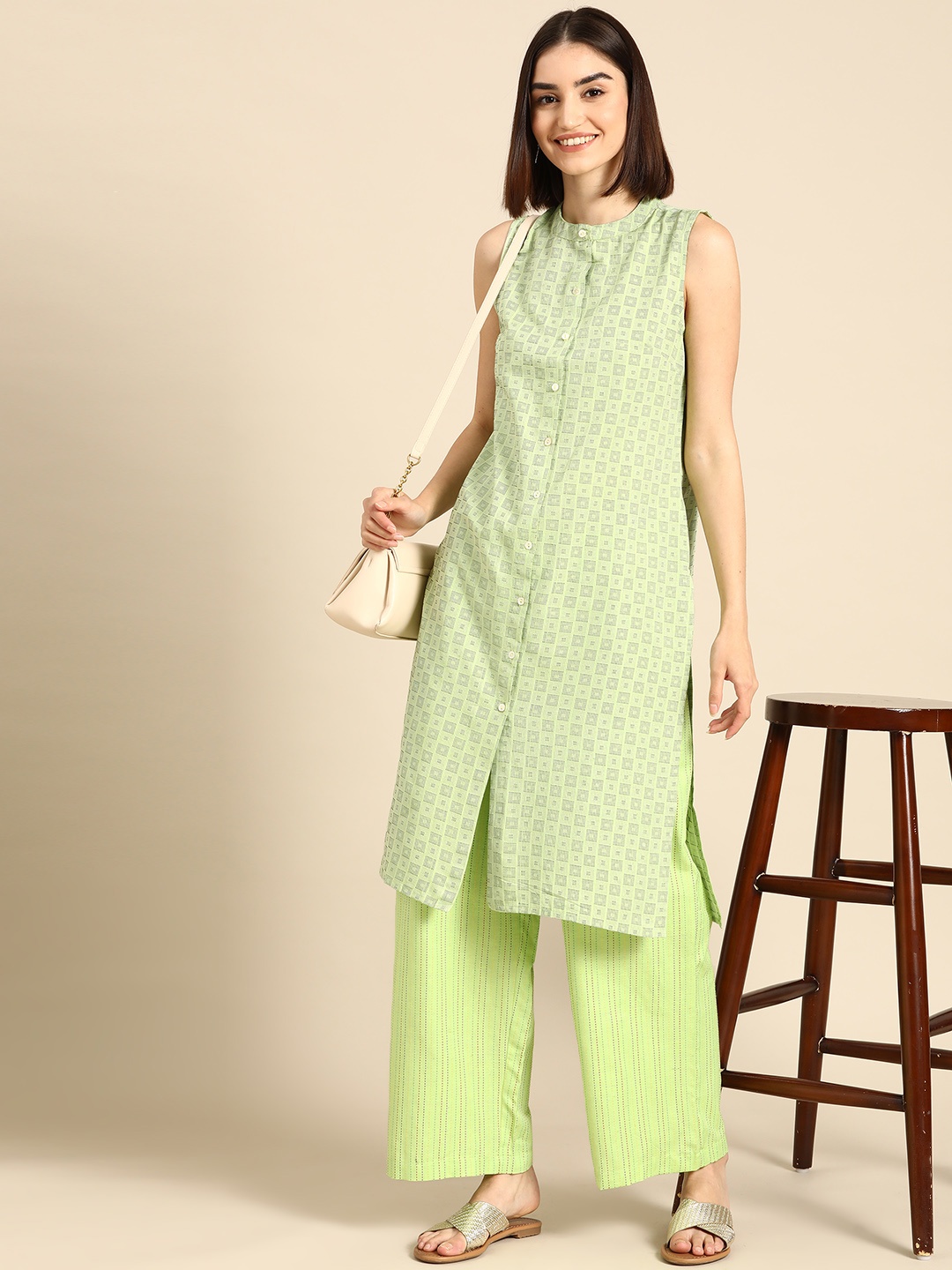 

Anouk Women Green Printed Yarn Dyed Kurta with Palazzos