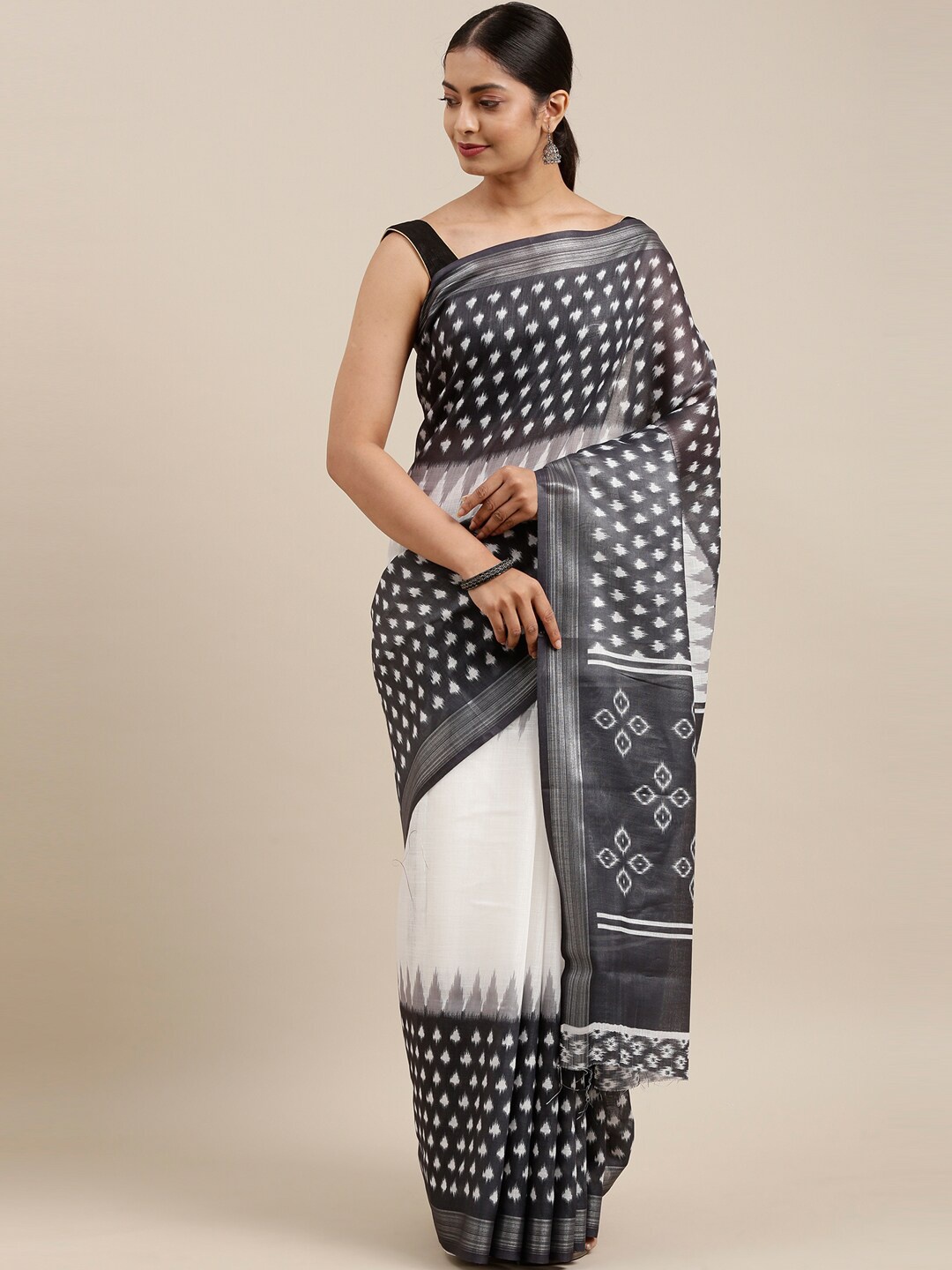 

The Chennai Silks Off White & Black Floral Linen Blend Fusion Saree