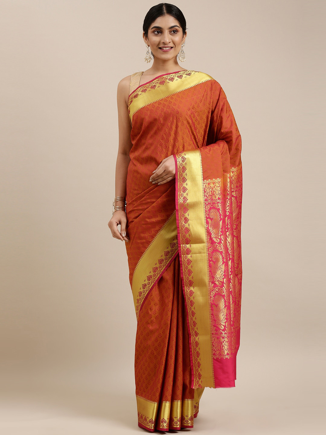 

The Chennai Silks Rust & Gold-Toned Ethnic Motifs Art Silk Saree