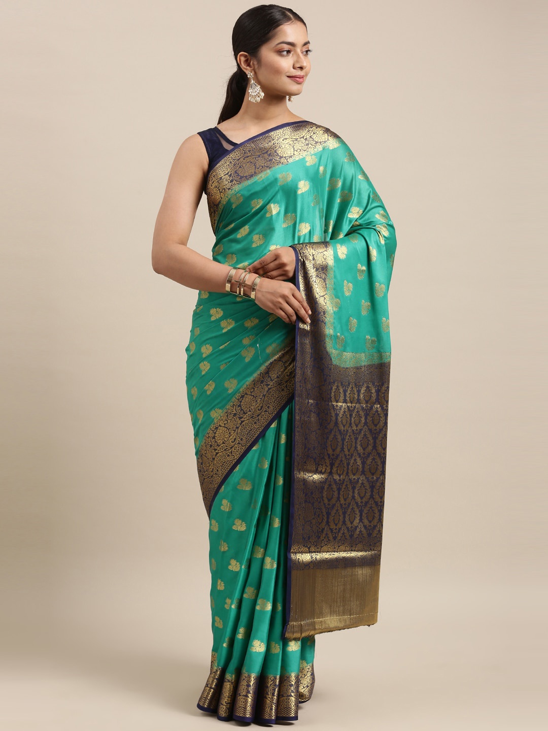 

The Chennai Silks Green & Navy Blue Ethnic Motifs Zari Saree