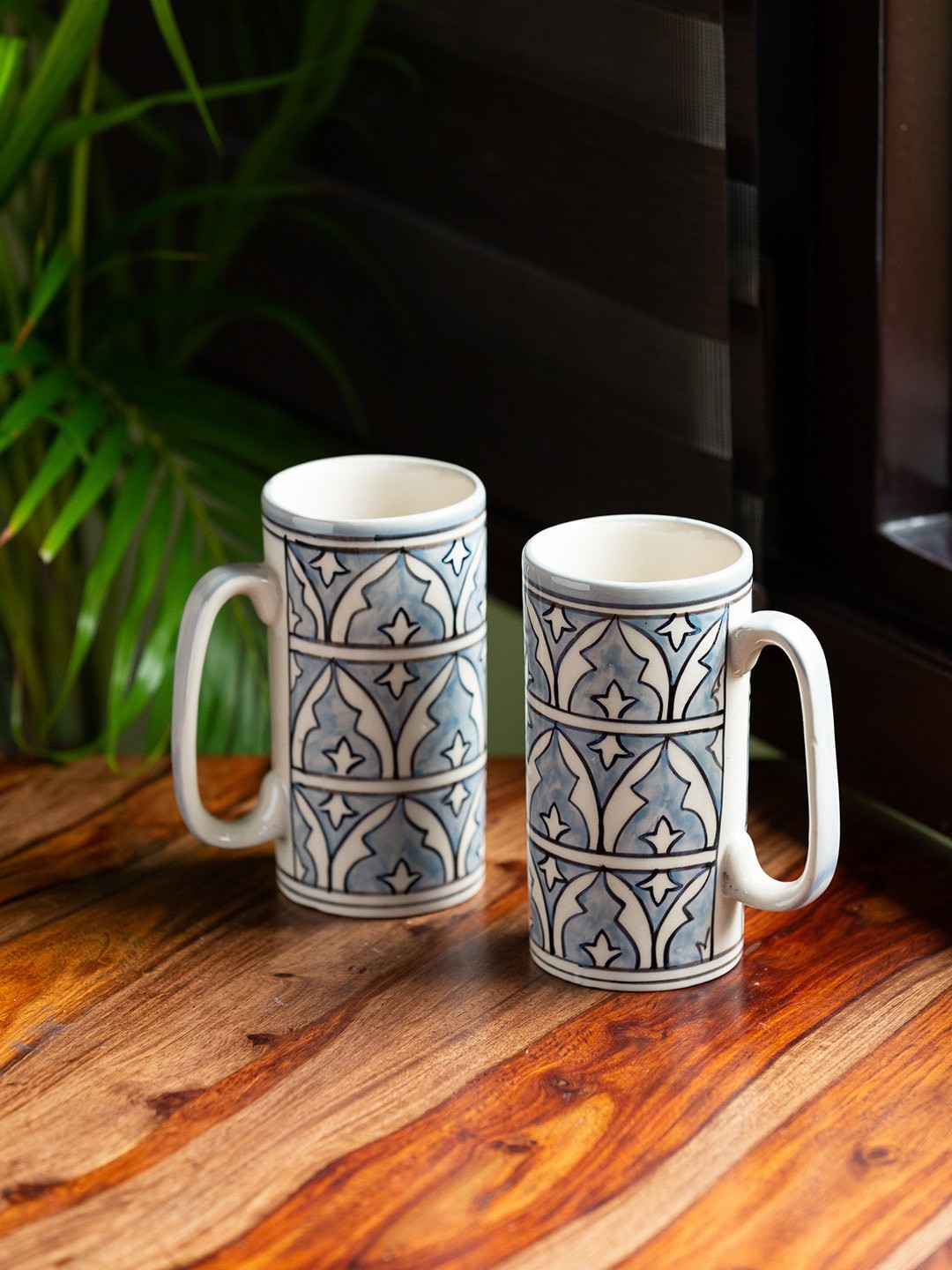 

ExclusiveLane Set of 2 Smoke Grey & White Hand-Painted Ceramic Beer Mugs - 560 ml