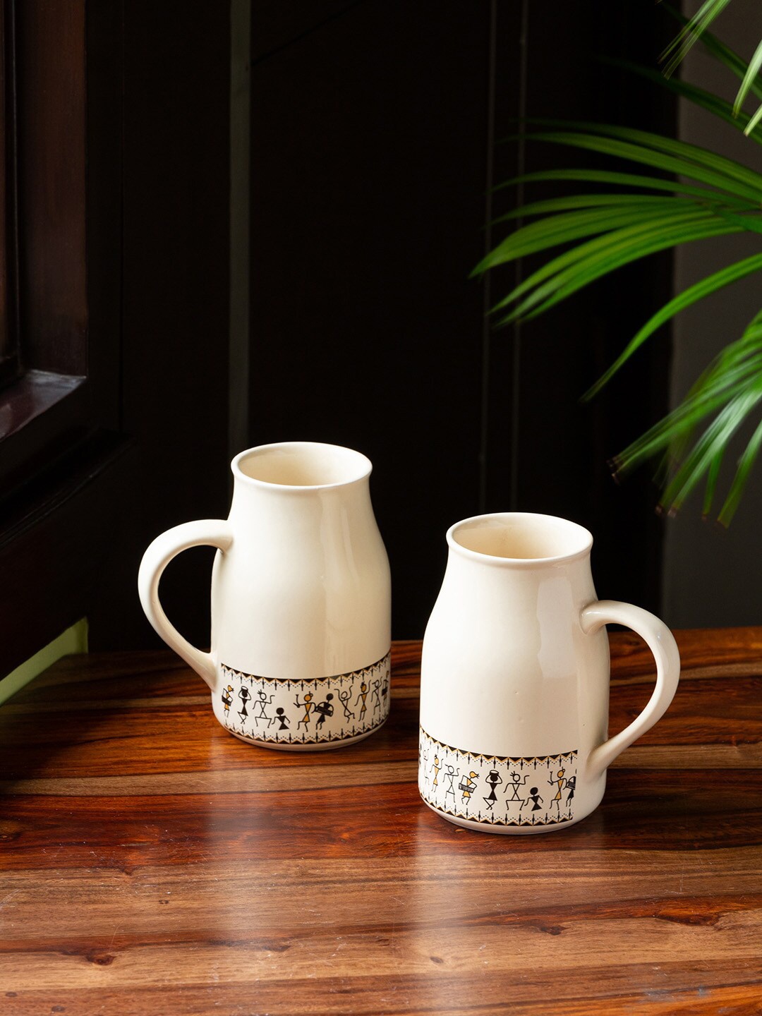 

ExclusiveLane Set Of 2 Cream-Coloured & Black Handcrafted Ceramic Beer Mugs And Glasses