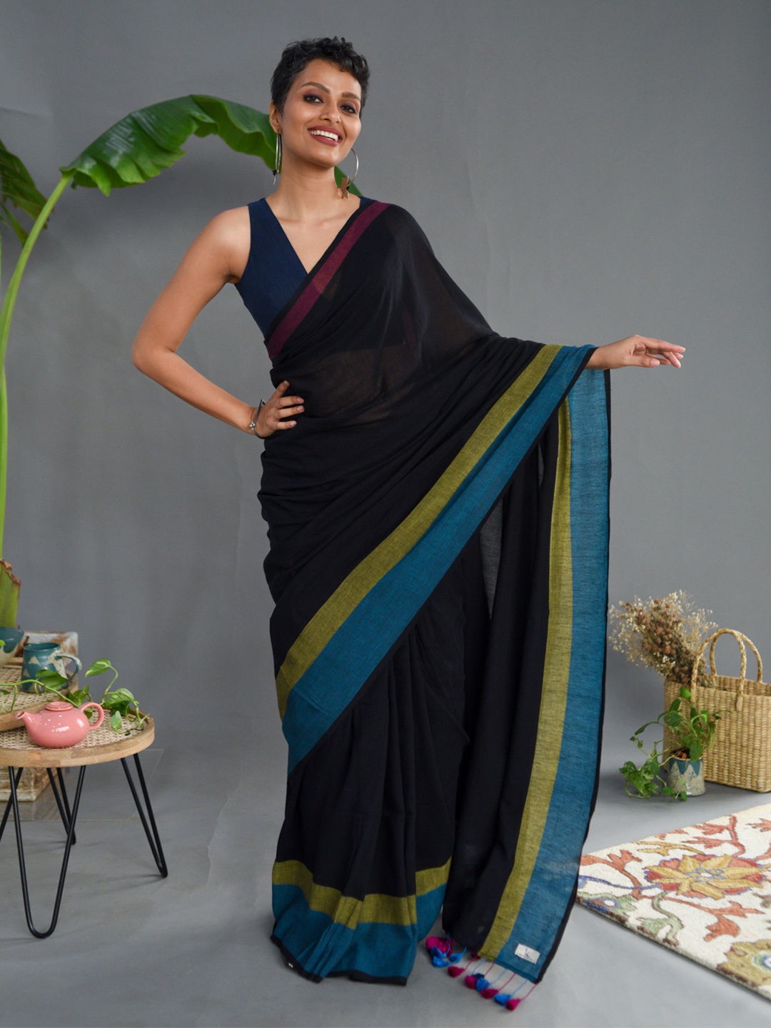 

Suta Black Pure Cotton Solid Saree