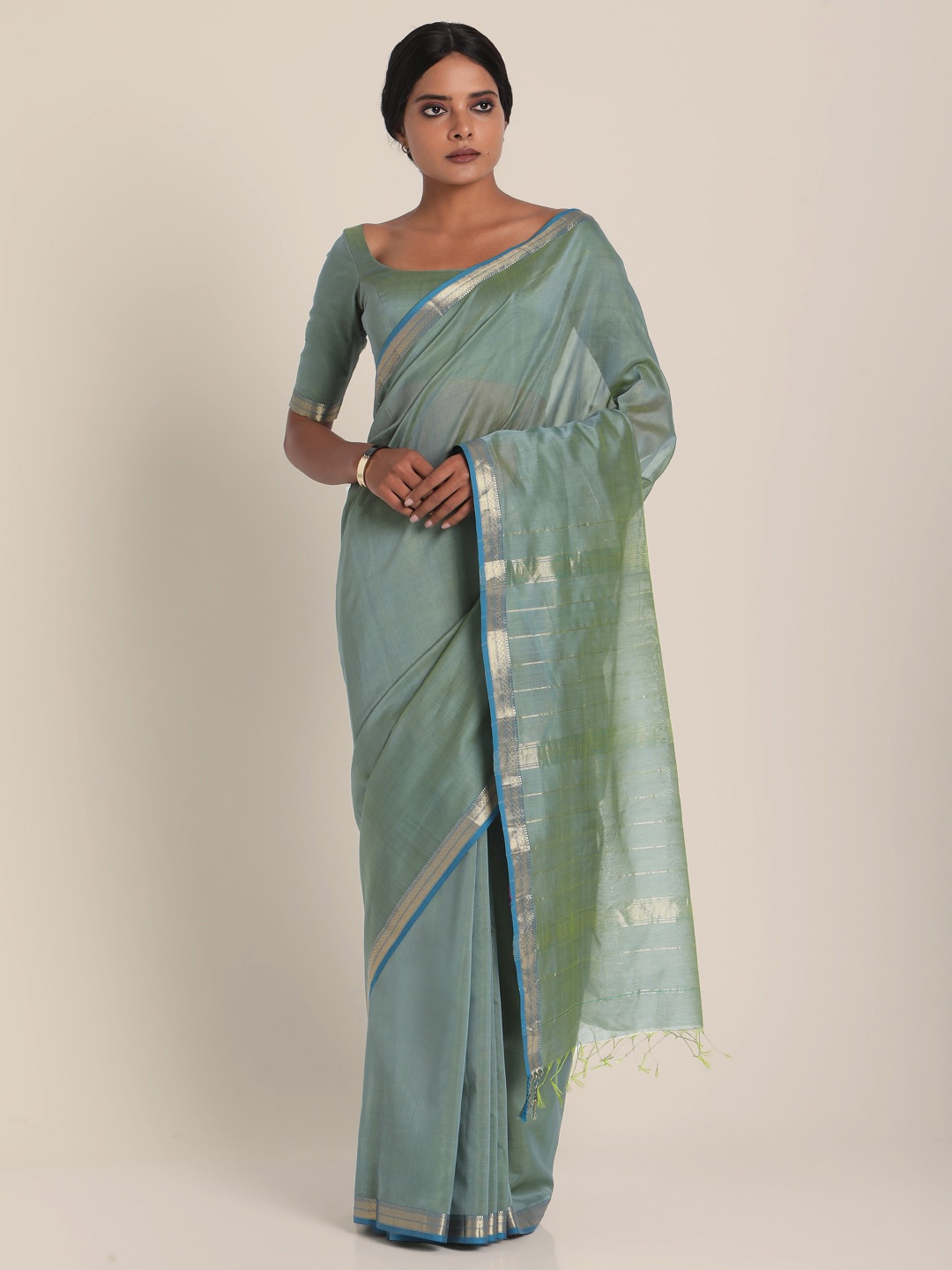 

Suta Women Grey & Silver-Toned Cotton Silk Solid Saree