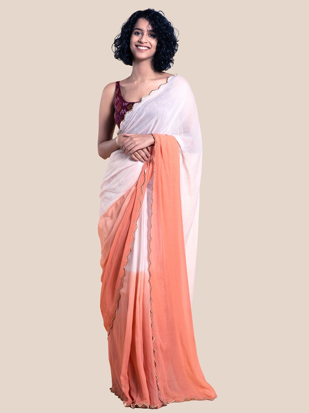 

Suta Orange & White Colourblocked Mul Saree