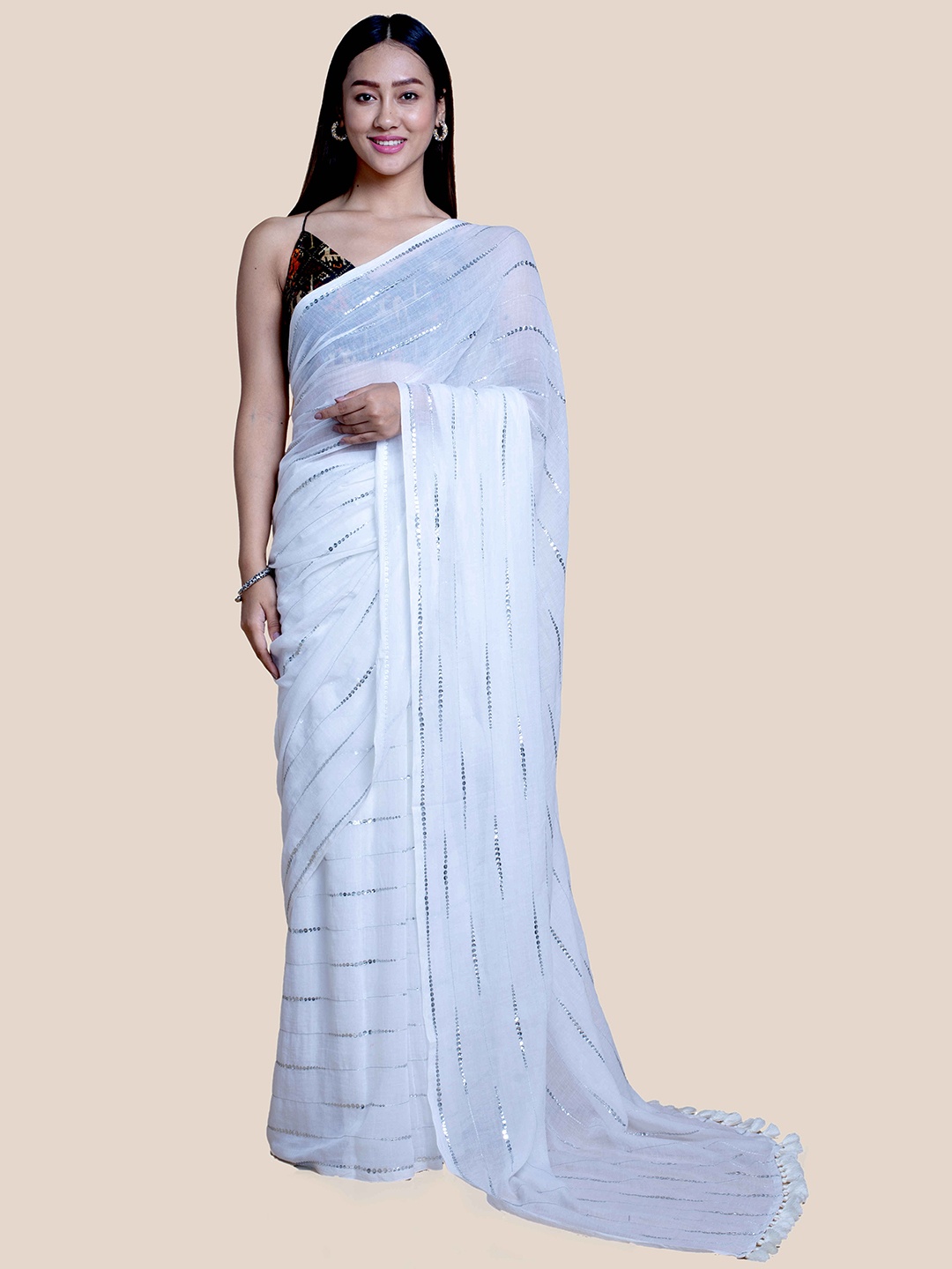 

Suta White Sequins Embellished Mul Saree