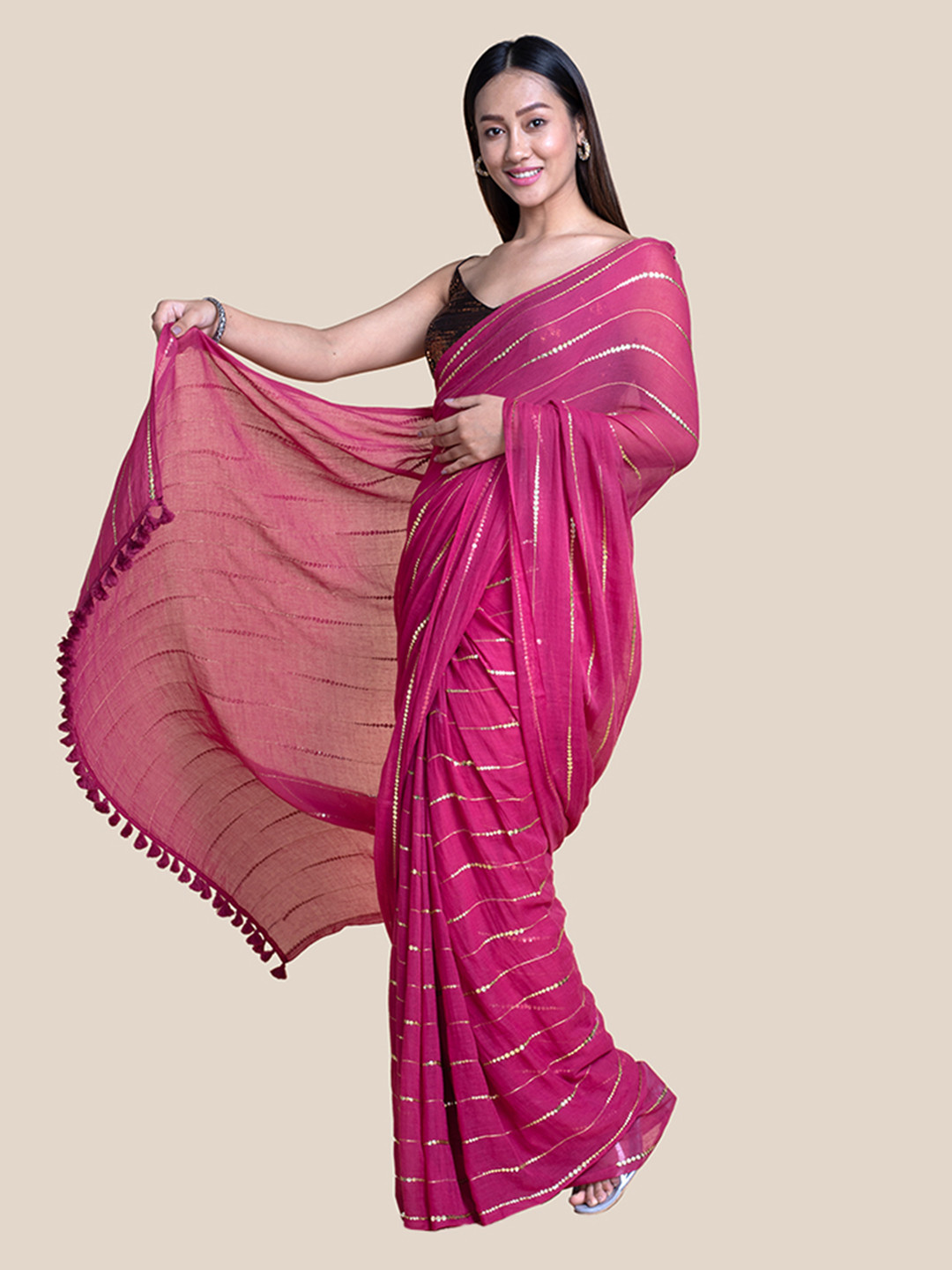

Suta Pink Sequins Embellished Mul Saree