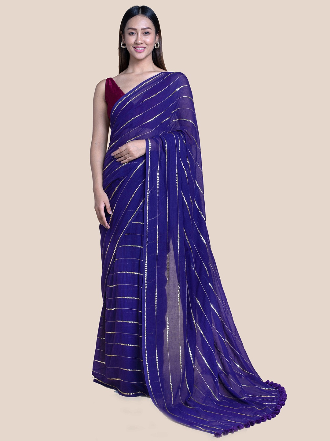 

Suta Purple Striped Sequins Embellished Mul Saree