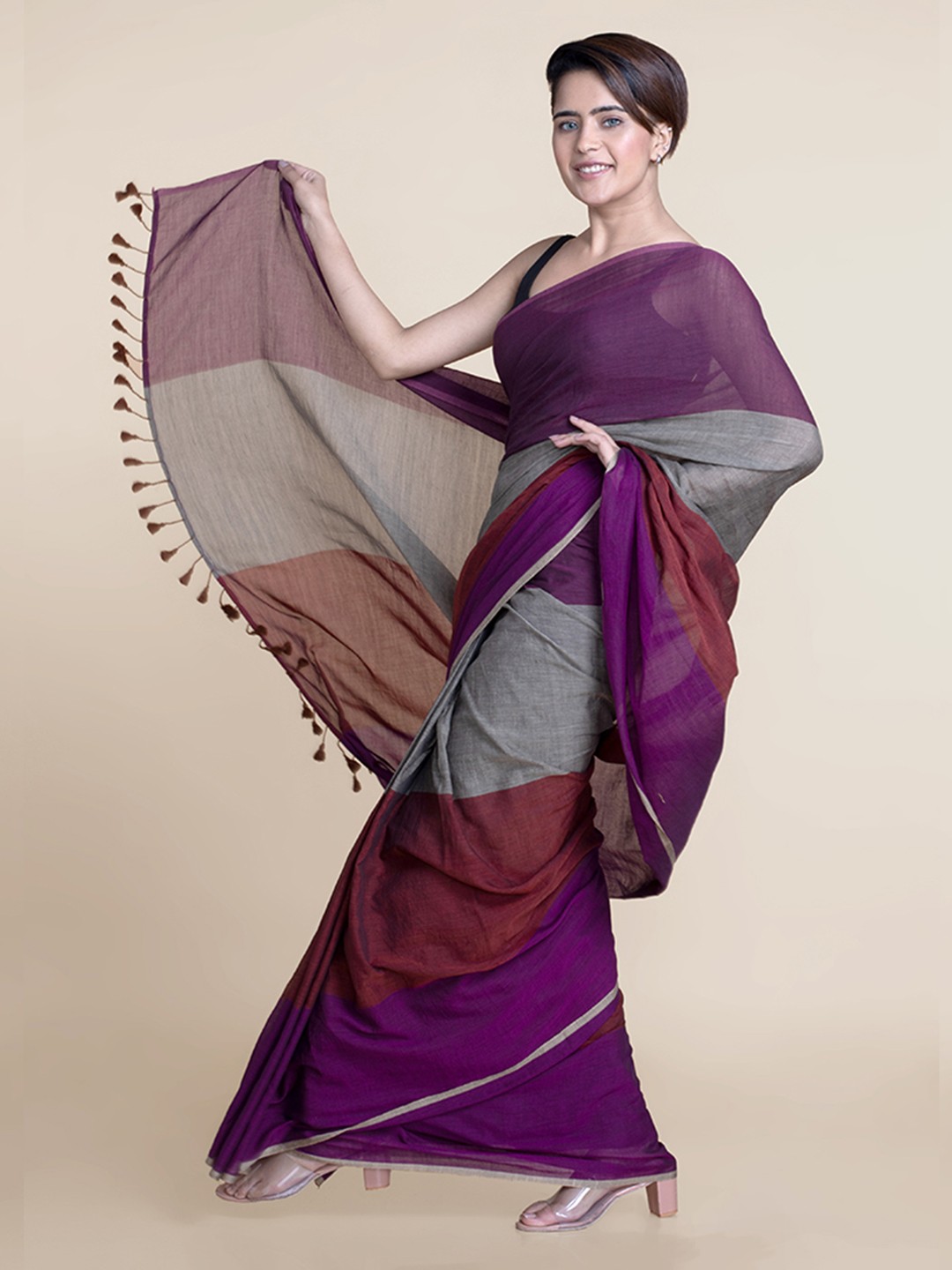 

Suta Purple & Brown Colourblocked Mul Saree