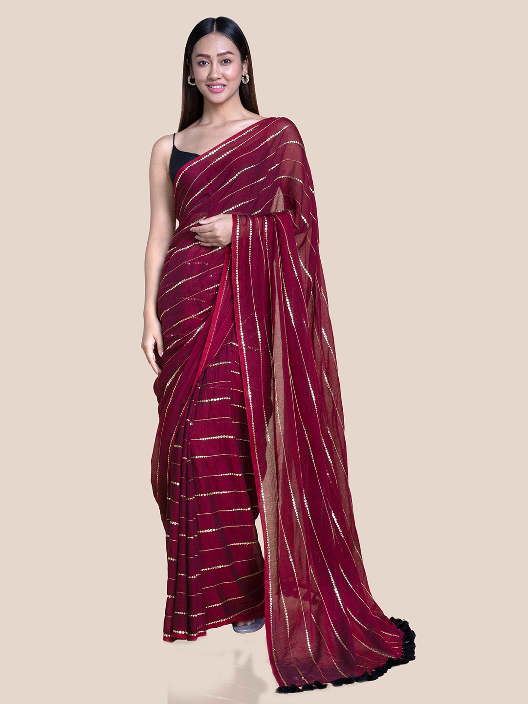 

Suta Maroon Striped Sequins Embellished Mul Saree