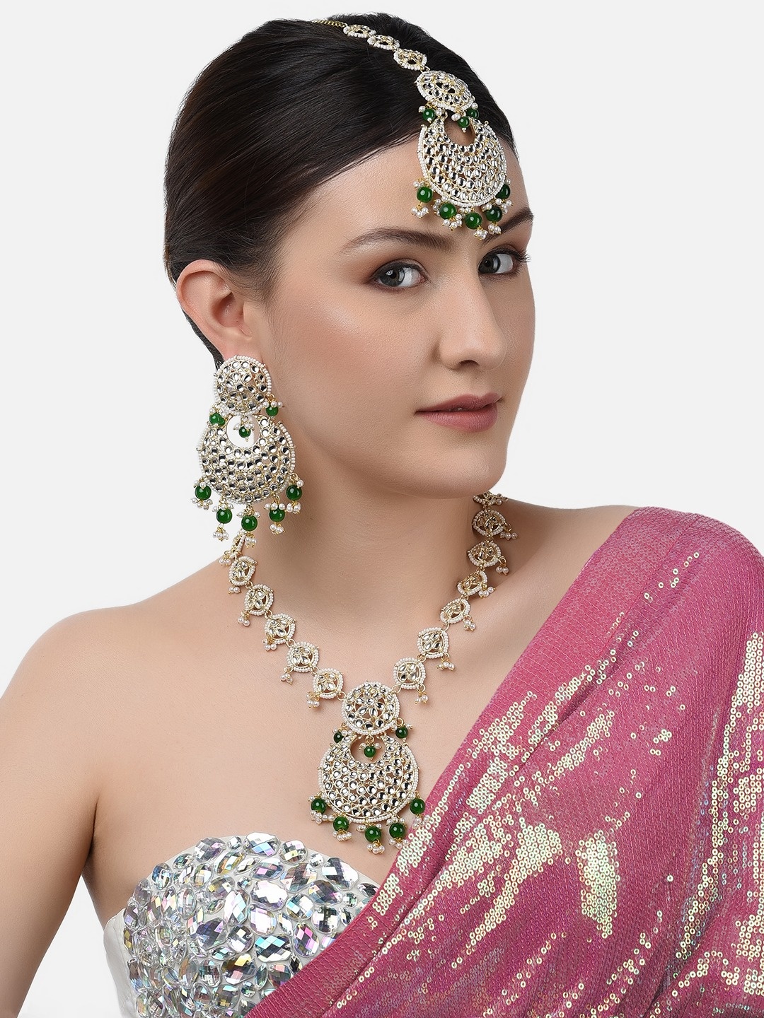 

Zaveri Pearls Gold-Plated Kundan-Studded & Green Pearl Beaded Jewellery Set