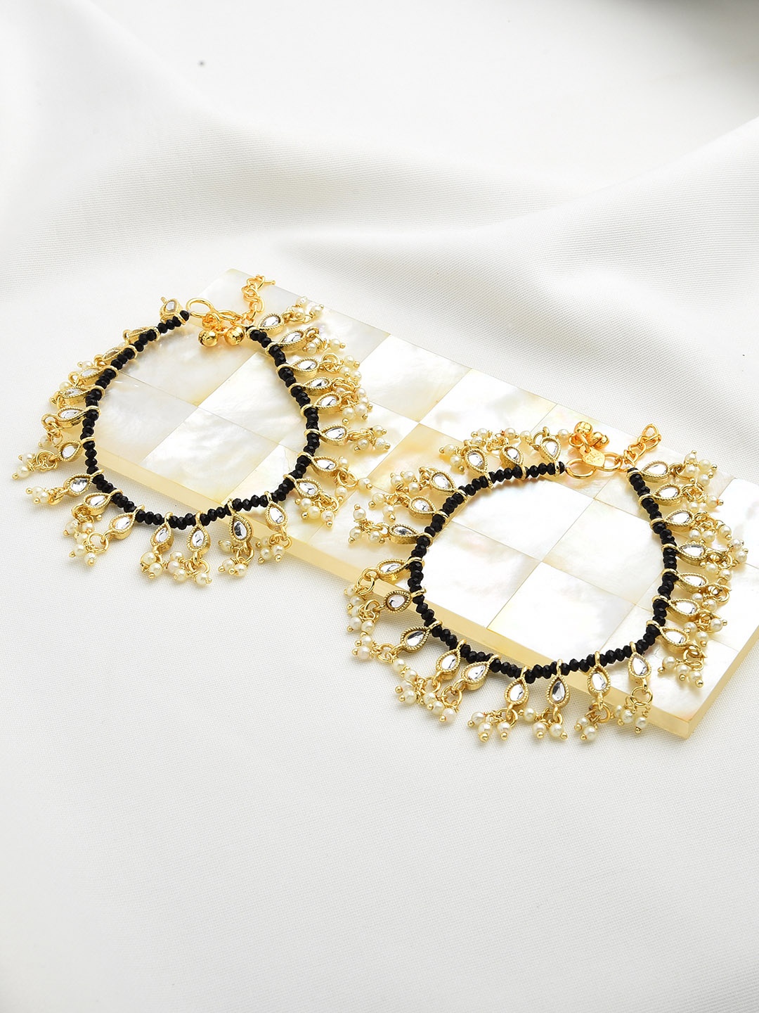 

Zaveri Pearls Set Of 2 Gold-Plated White Kundan Studded & Black Beaded Anklets