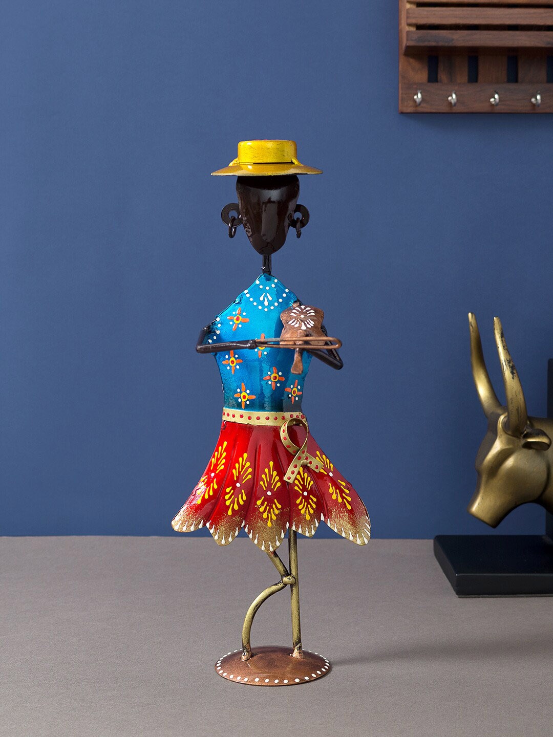 

Golden Peacock Blue & Red Handcrafted & Hand-Painted Flute Playing Musician Decorative Showpiece