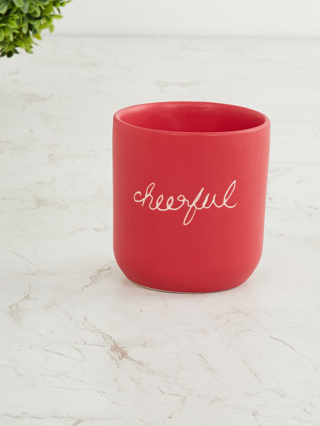 

Home Centre Red & White Printed Ceramic Planter