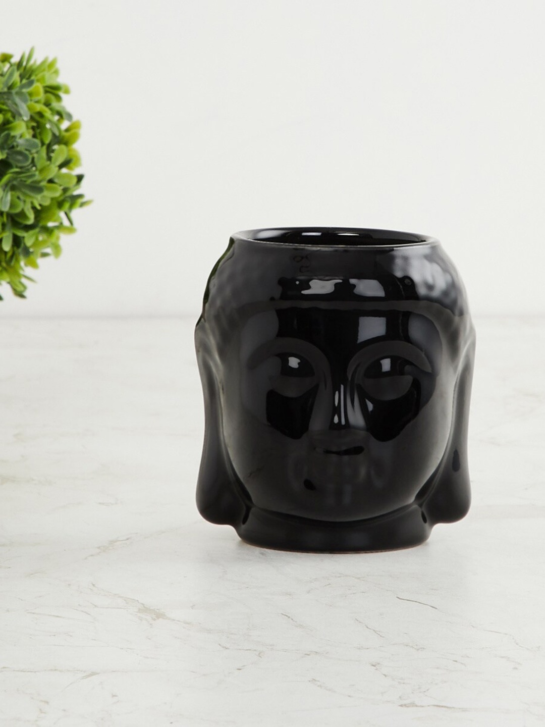 

Home Centre Black Solid Ceramic Planter