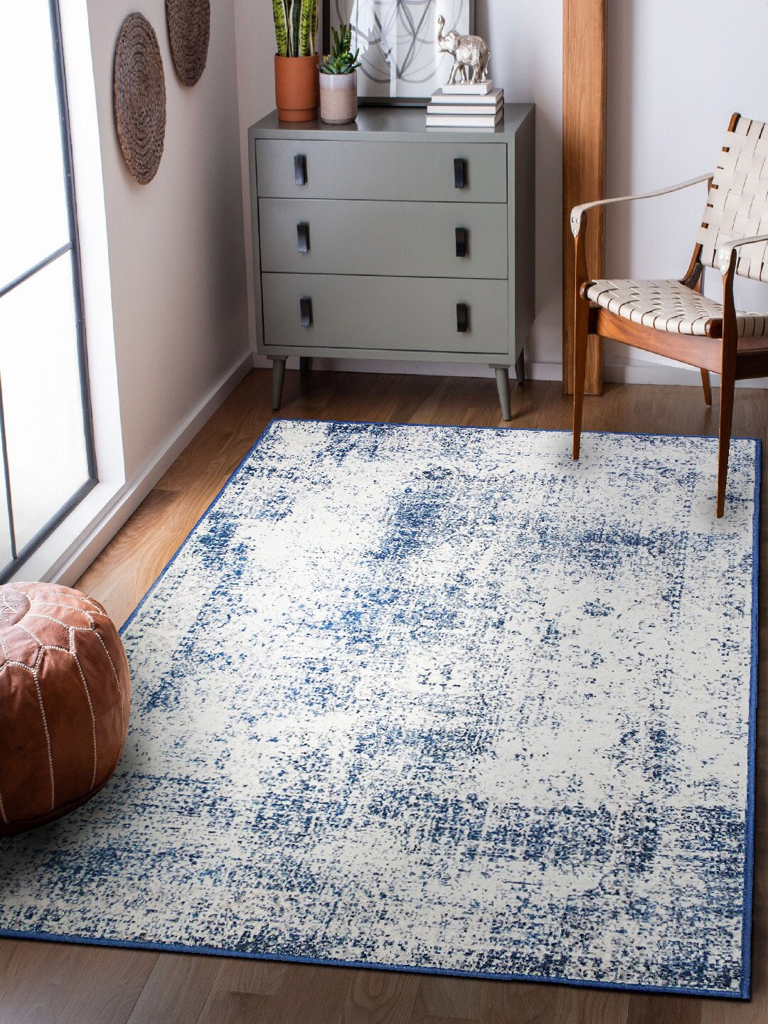 

Status Cream-coloured & Blue Printed Anti-Skid Carpet