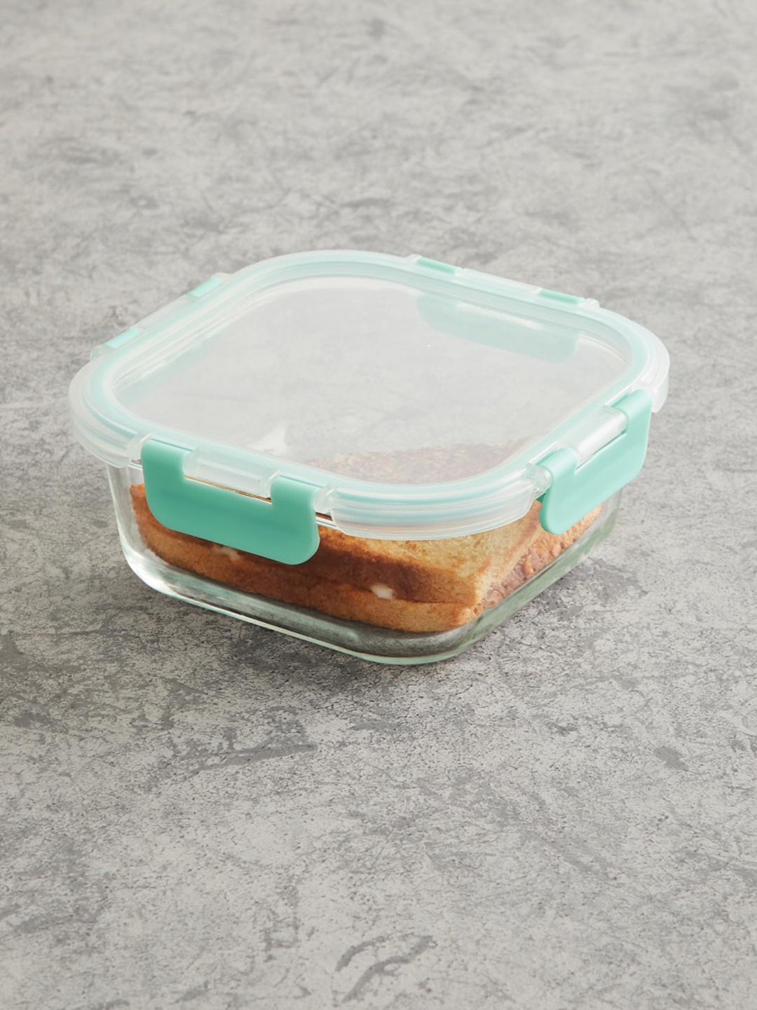 

Home Centre Transparent & Sea Green Glass Food Container With Lid