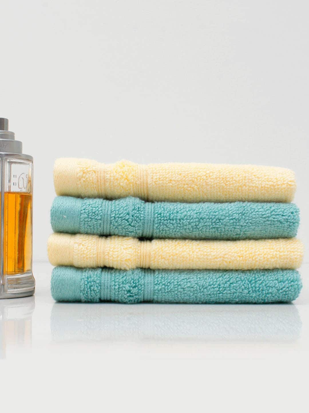 

AVI Living Set Of 4 Green & Yellow Solid 450 GSM Pure Cotton Face Towel