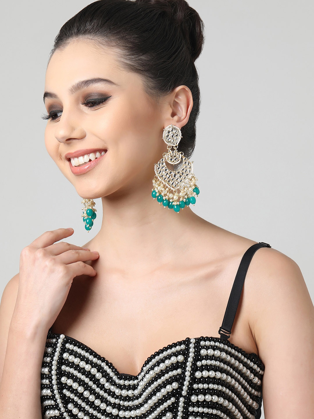 

Zaveri Pearls Green Beaded & Kundan Studded Contemporary Chandbali Earrings