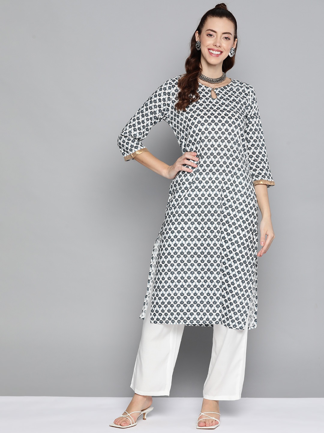

HERE&NOW Women White Floral Printed Regular Kurta with Palazzos