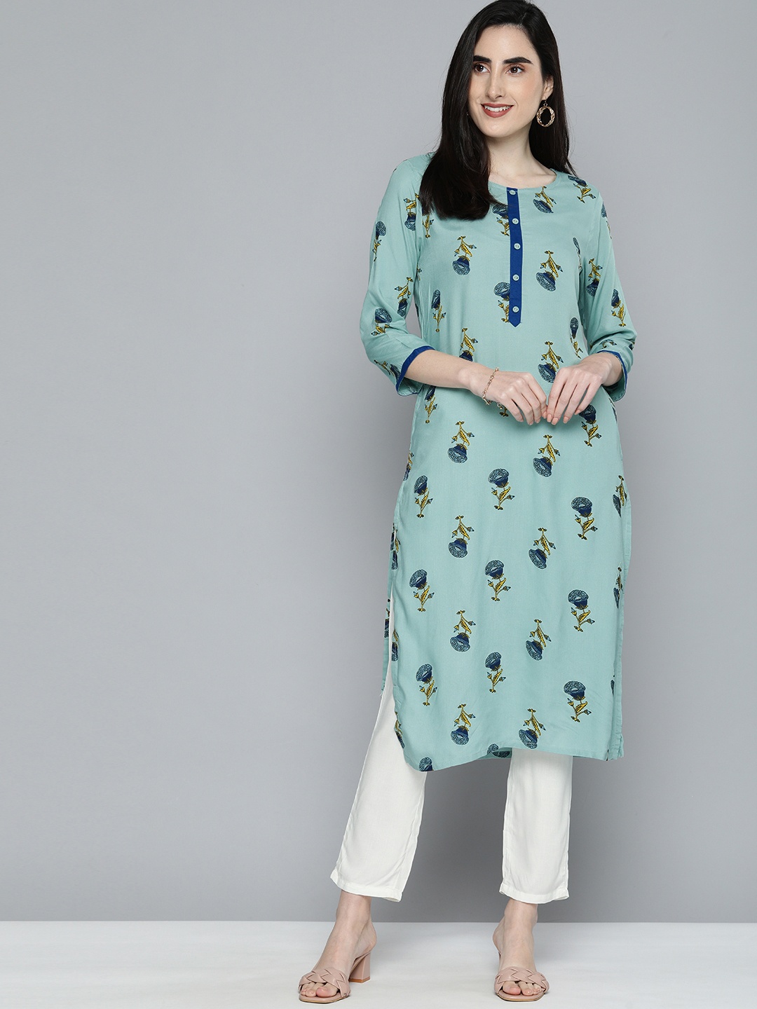 

HERE&NOW Women Light Blue Floral Printed Regular Straight Kurta with Trousers
