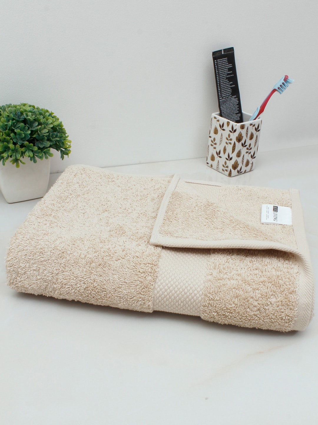 

AVI Living Beige Solid 500 GSM Pure Cotton Bath Towel