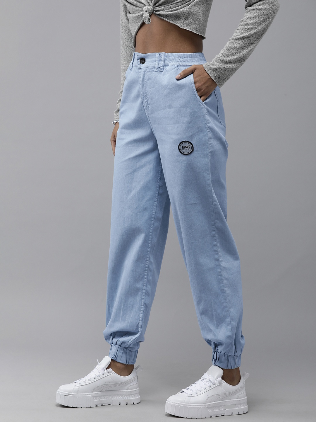 

The Roadster Lifestyle Co Women Blue High Rise Joggers Fit Trousers