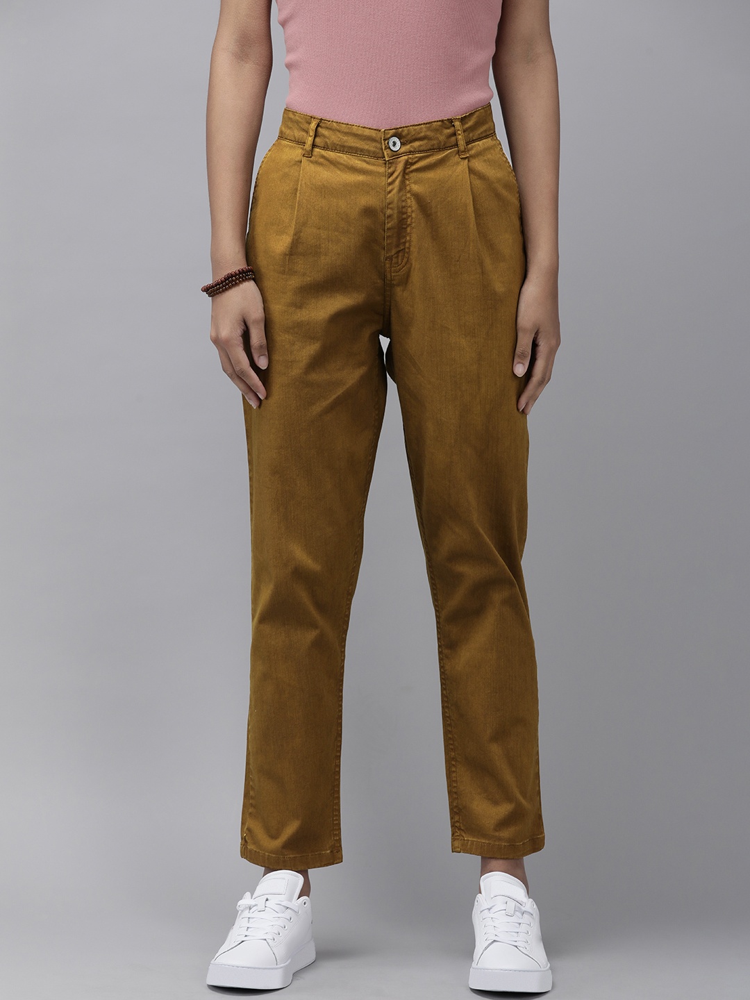 

Roadster Women Brown Solid Boyfriend Fit Regular Trousers