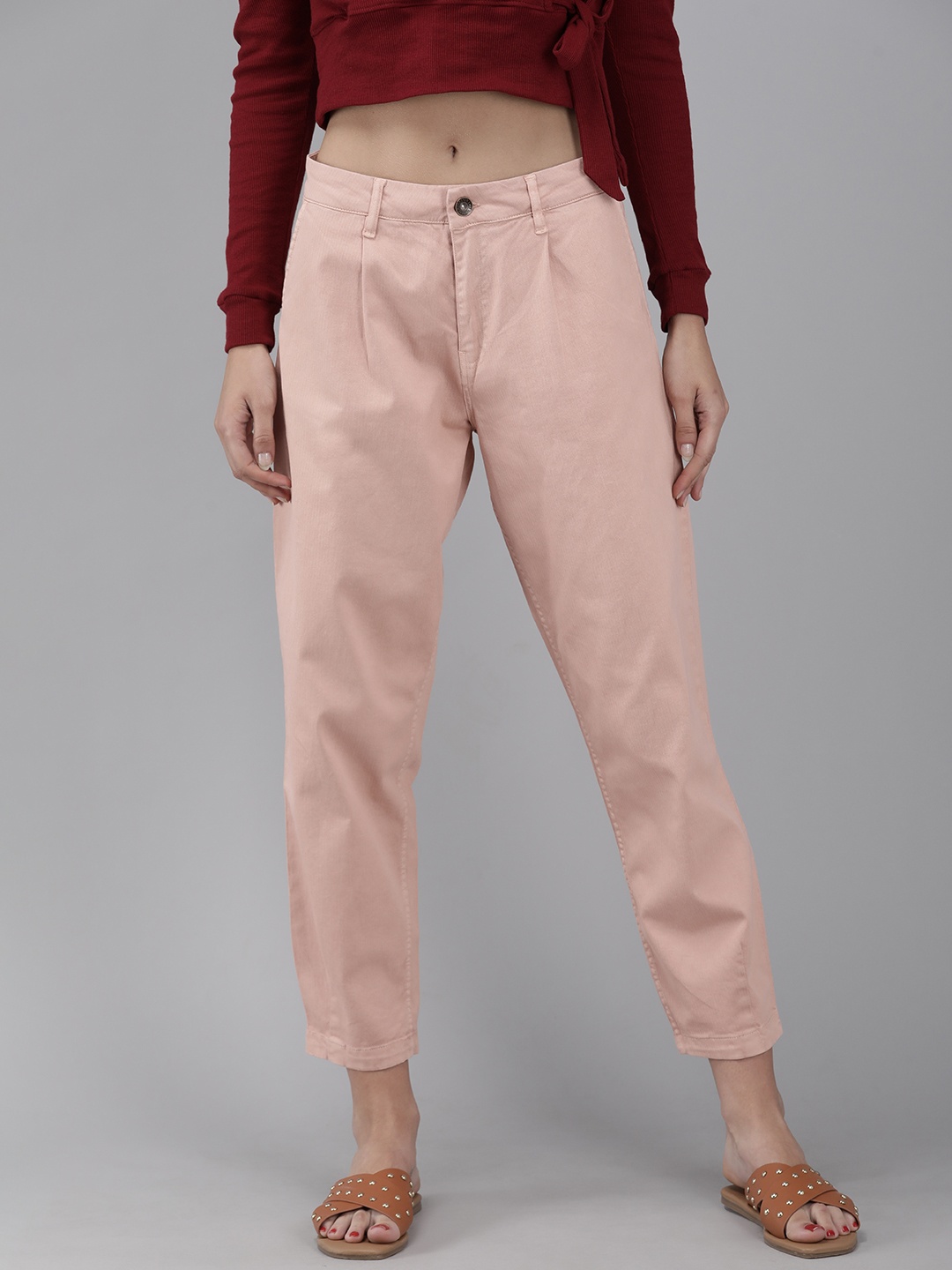 

The Roadster Lifestyle Co Women Peach-Coloured Printed Slouchy Fit Cropped Trousers