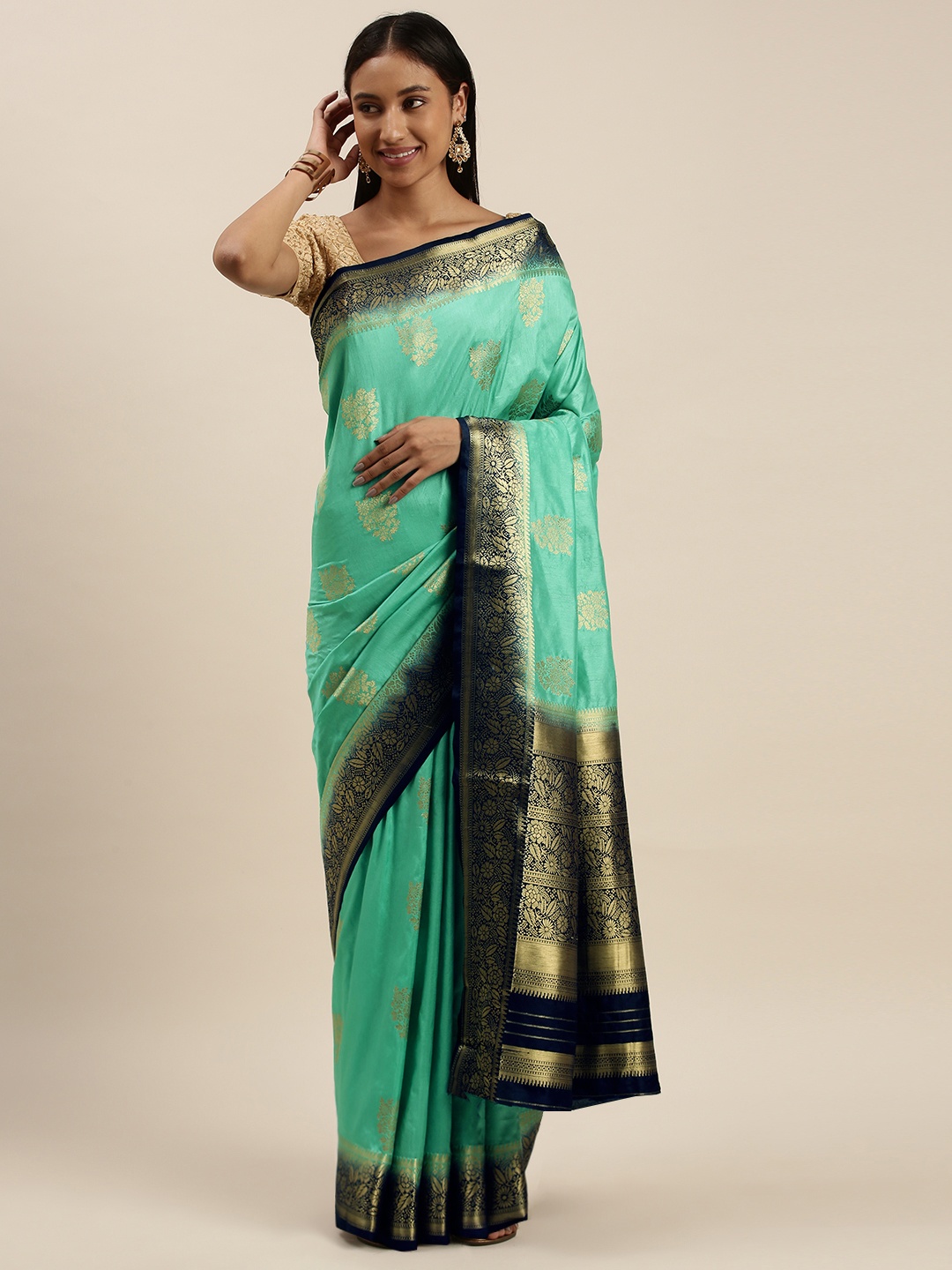 

Mitera Turquoise Blue Ethnic Motifs Zari Silk Blend Mangalagiri Saree