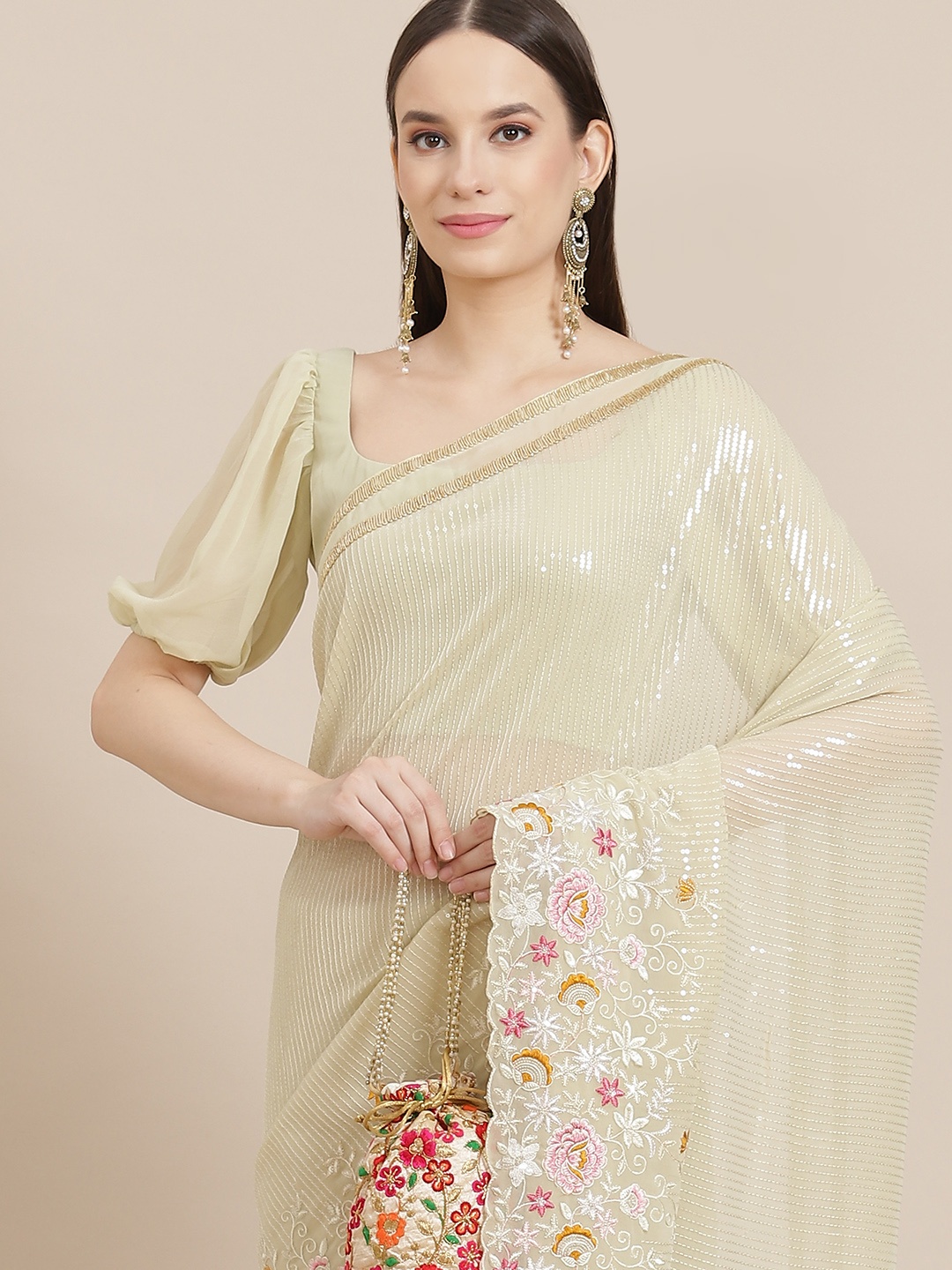 

Inddus Green Sequinned Saree
