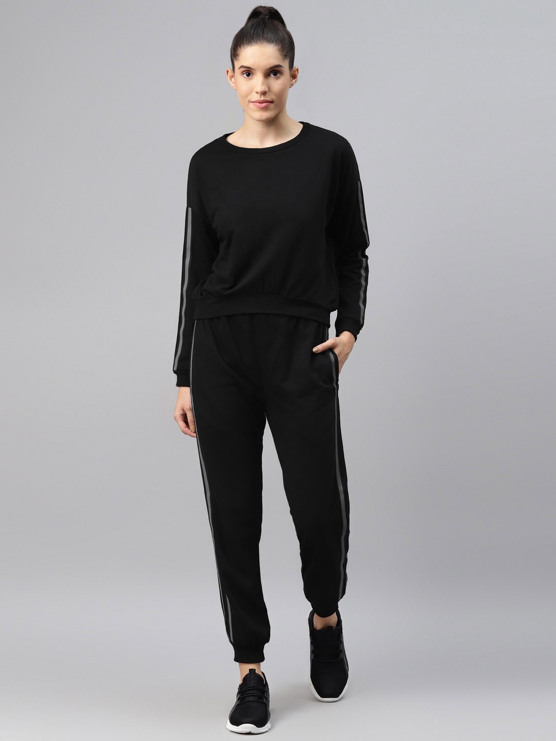 

Laabha Women Black Tracksuit With Reflector Tapes