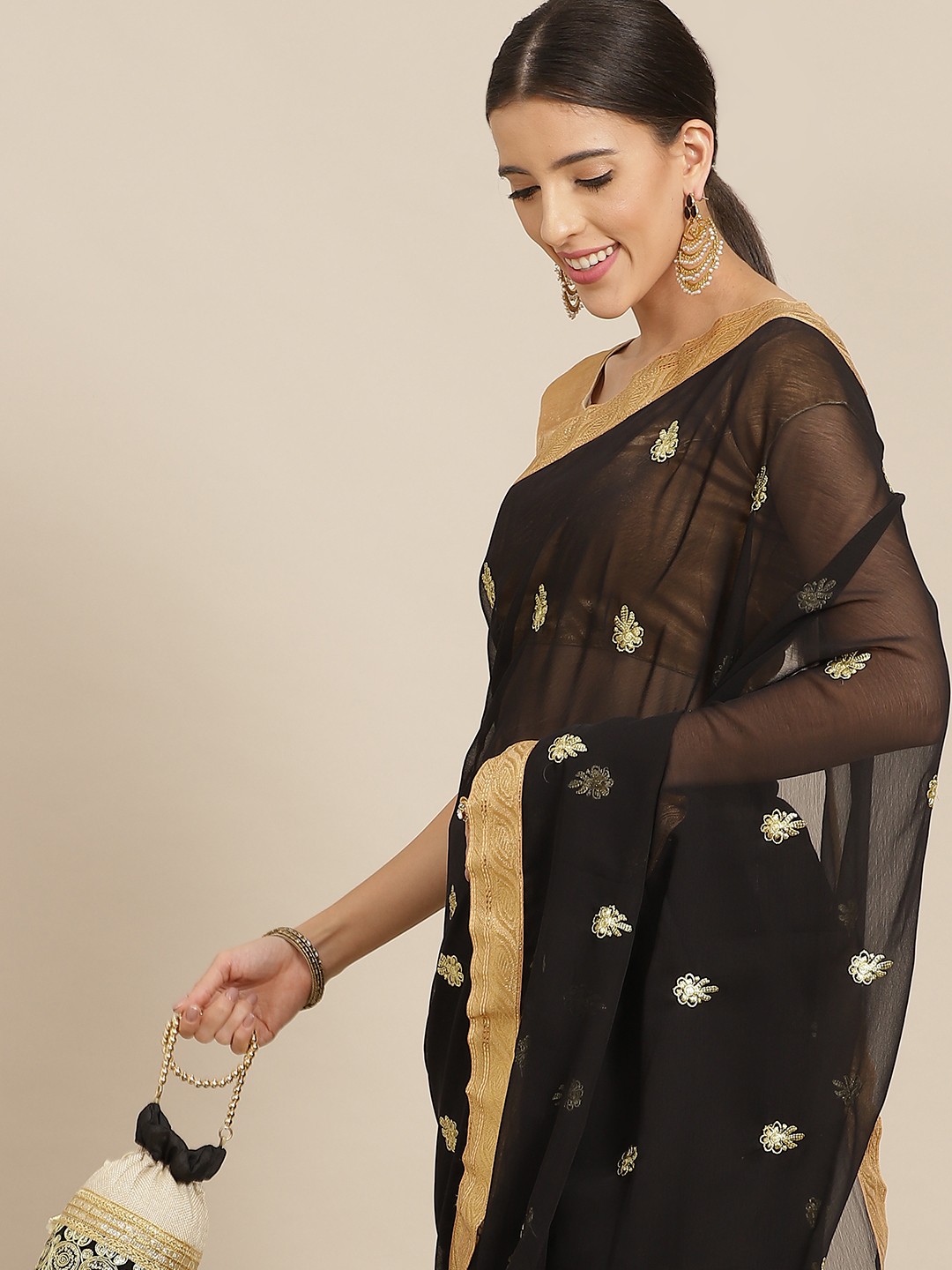 

Anouk Black & Gold Floral Embroidered Poly Georgette Saree