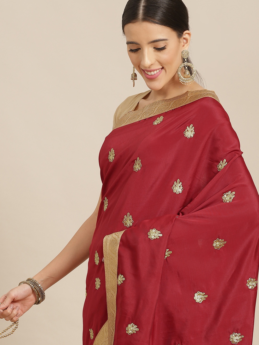 

Anouk Maroon & Gold Floral Zari Polyester Saree