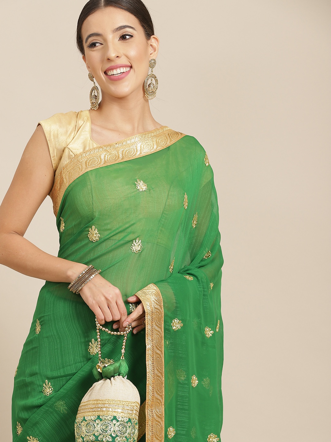 

Anouk Green & Gold Floral Zari Poly Georgette Saree