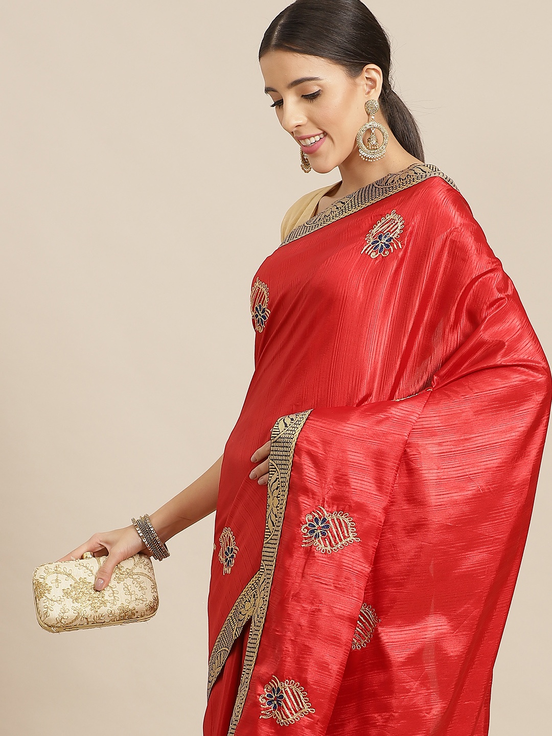 

Anouk Maroon & Gold Ethnic Motifs Silk Blend Saree