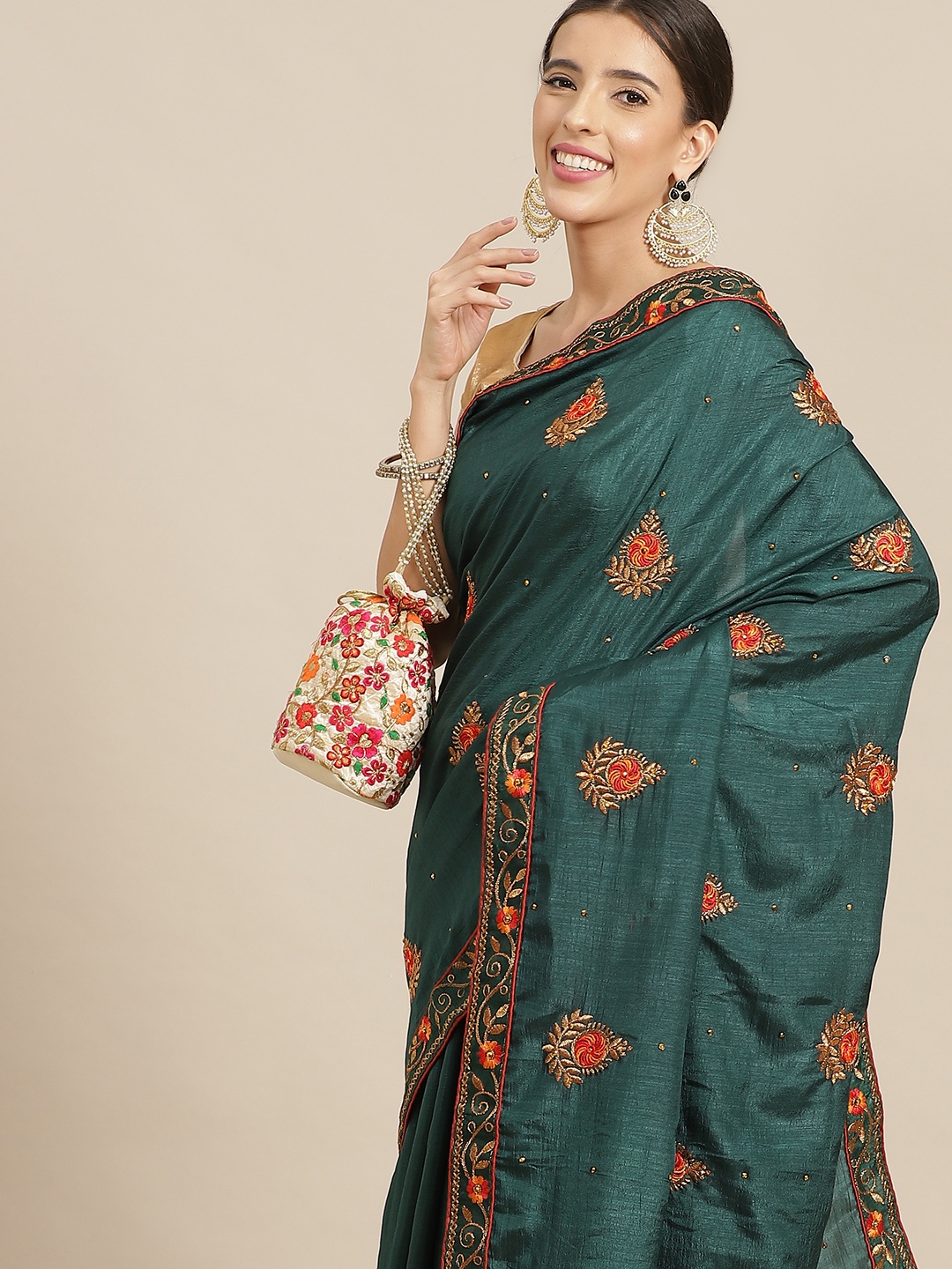 

Anouk Green Ethnic Motifs Beads and Stones Silk Blend Saree
