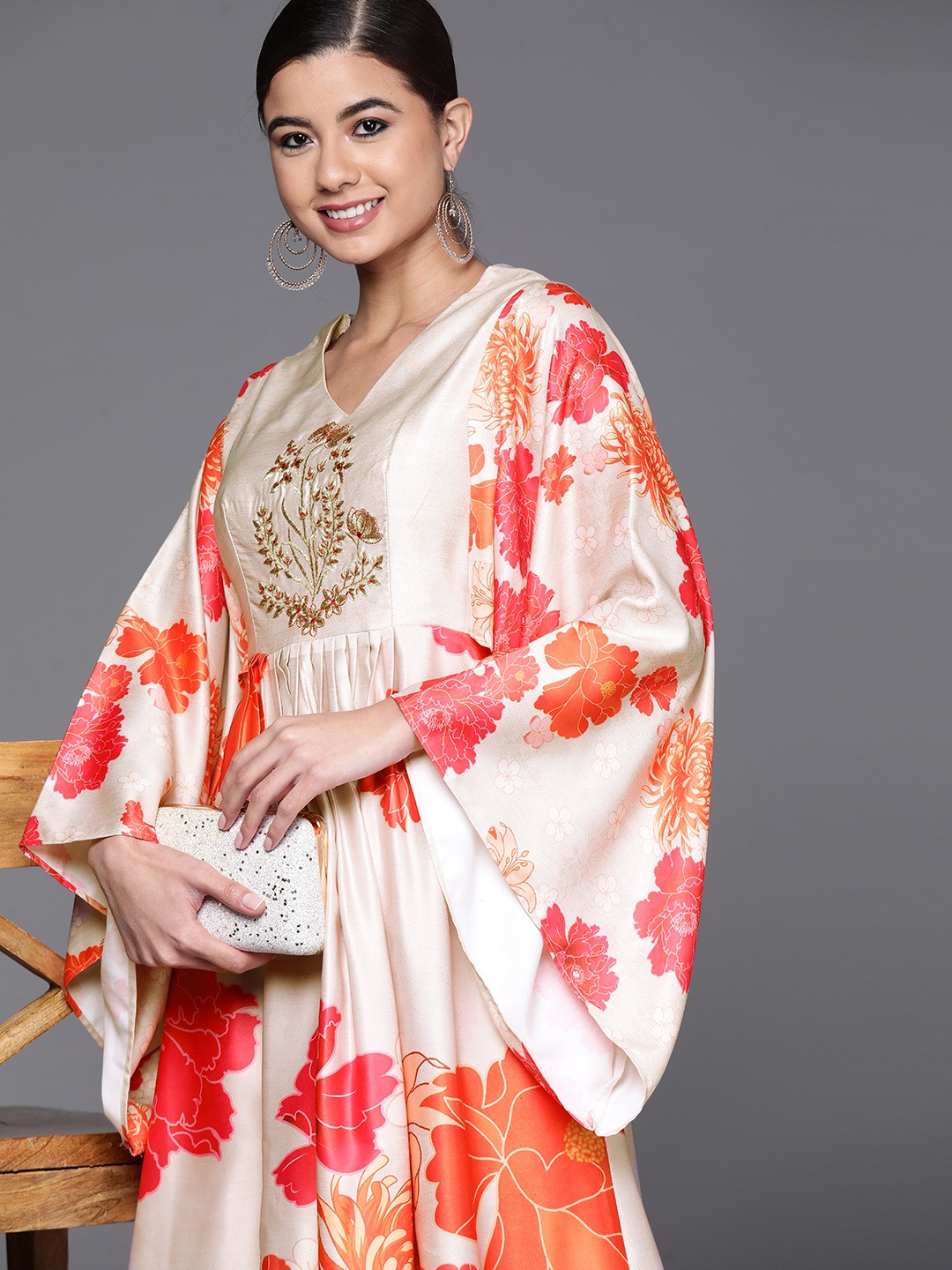 

Inddus Women Beige Floral Printed Pleated Thread Work Kurta with Trousers