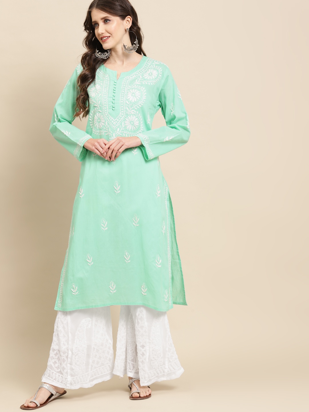 

Saadgi Women Sea Green & White Embroidered Kurta with Palazzos