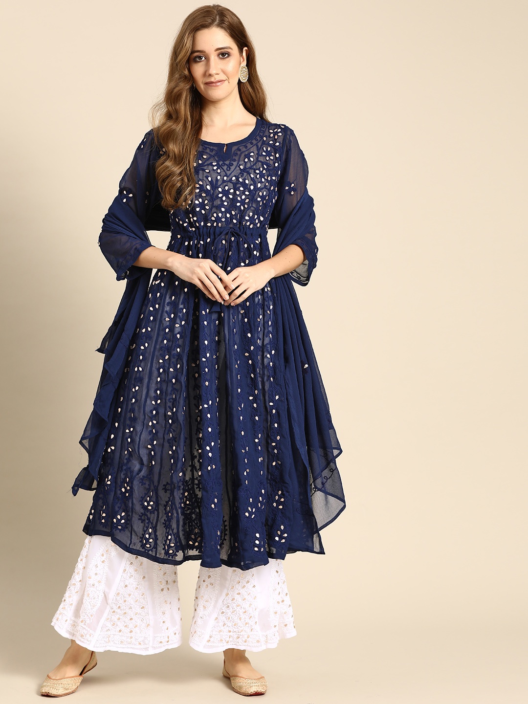 

Saadgi Women Navy Blue Floral Embroidered Regular Sequinned Kurta with Sharara & With Dupatta