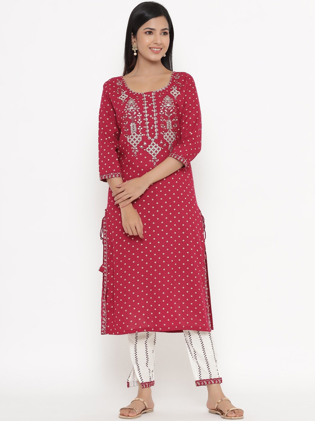 

UNISETS Women Maroon Ethnic Motifs Embroidered Regular Kurta with Trousers