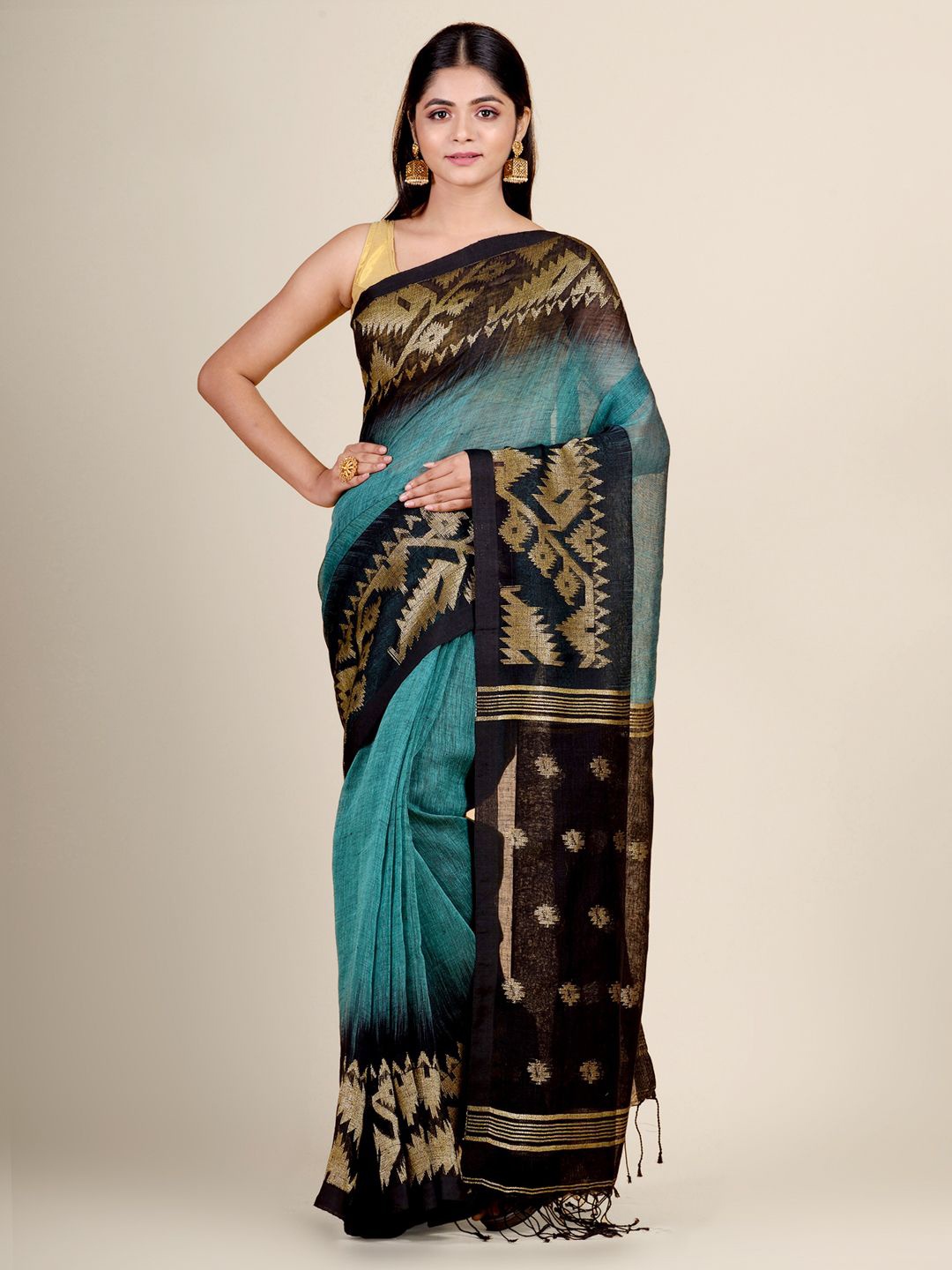 

Charukriti Teal & Black Woven Design Pure Linen Ikat Saree