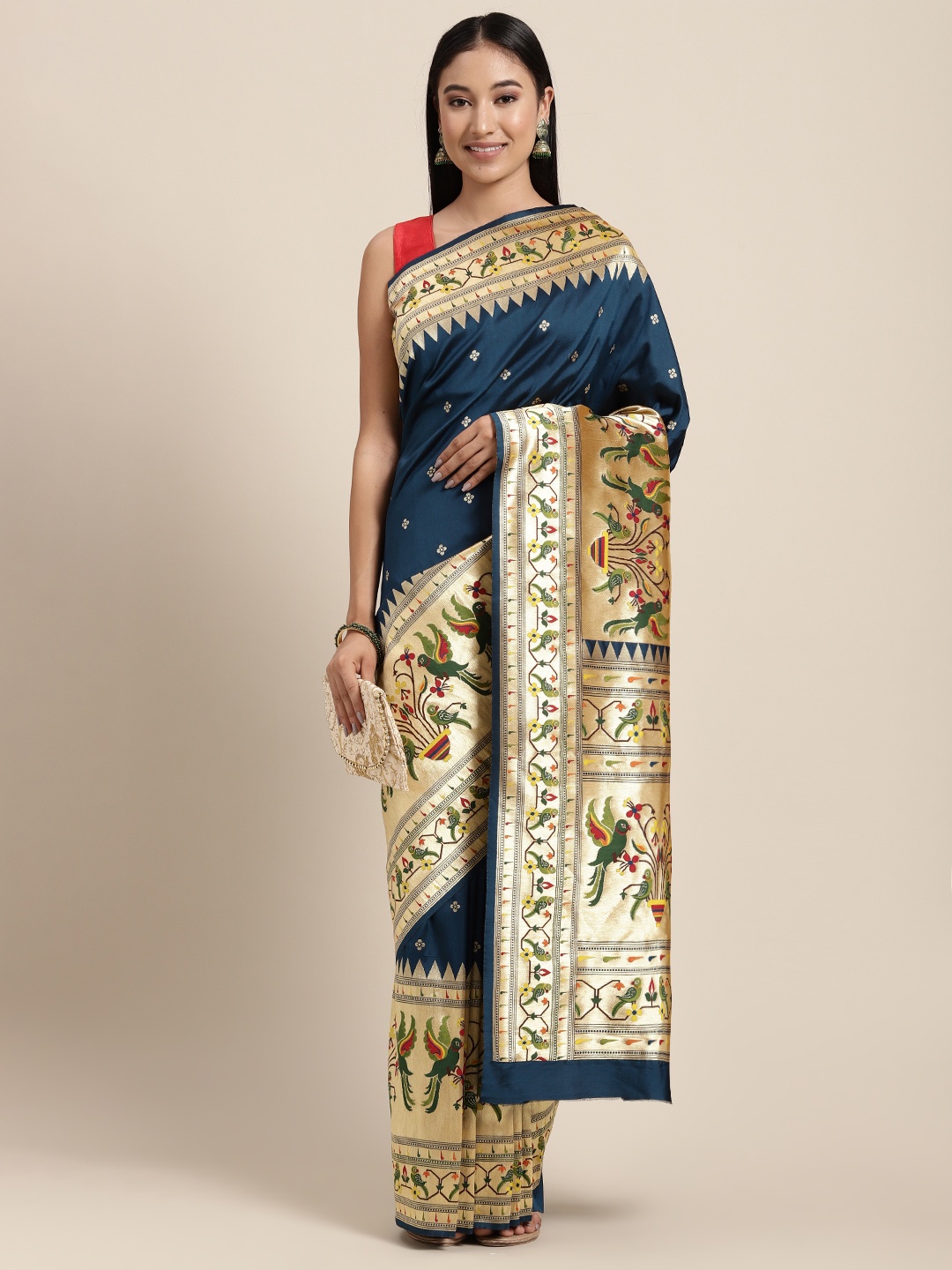 

Neerus Teal & Gold-Toned Ethnic Motifs Zari Pure Silk Saree