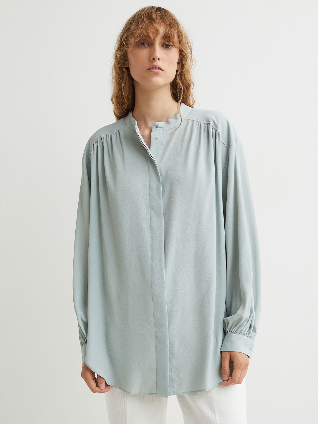

H&M Women Turquoise Blue Solid Long-Sleeved Blouse